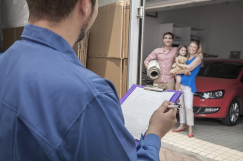 Loading furniture and boxes into a moving truck in West Norwood