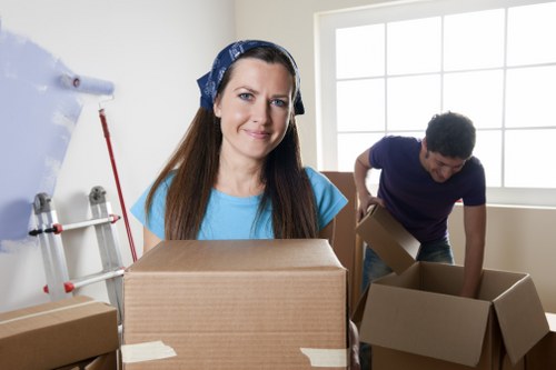 Commercial removals van loading office items in West Norwood