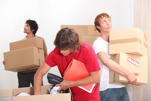 Packed boxes and household items ready for a local move in West Norwood
