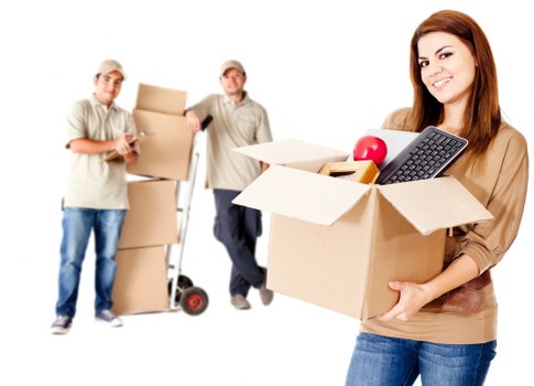 Packed office equipment and furniture ready for relocation
