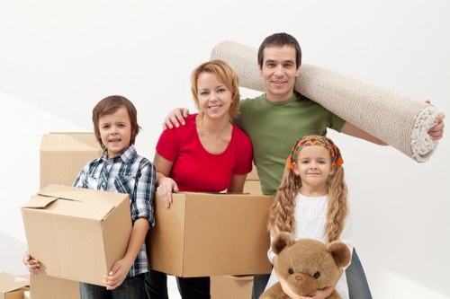 Professional movers handling a flat move with stairs access