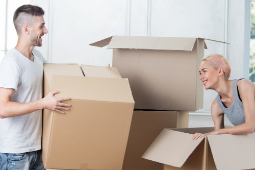 Local moving team handling furniture in West Norwood