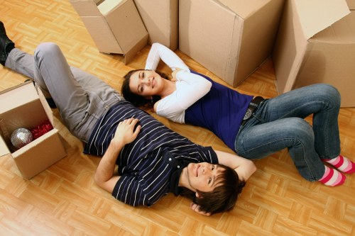 Packed boxes and furniture ready for a removal van move