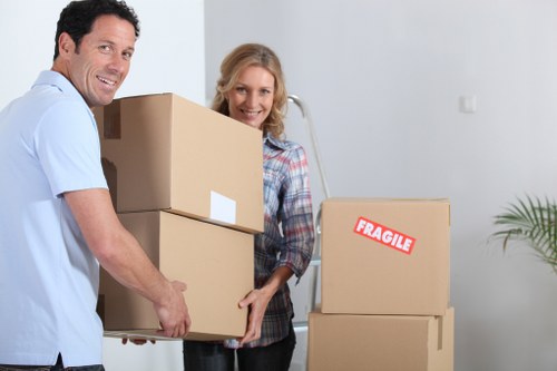 Careful wrapping and box labelling during a local packing service